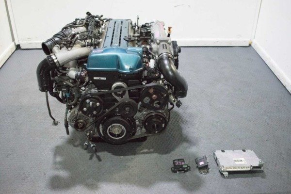 Low Mileage JDM 92-99 Toyota Aristo 2JZ-GTE VVT-i front sump engine with automatic transmission, ECU, MAF, Igniter, and wiring harness for sale.