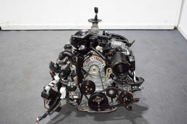 Low Mileage Clean 03-08 Mazda RX8 13B Non Turbo 6 Port Engine & 6 Speed Manual Transmission Replacement with OEM Exhaust Manifold for sale.