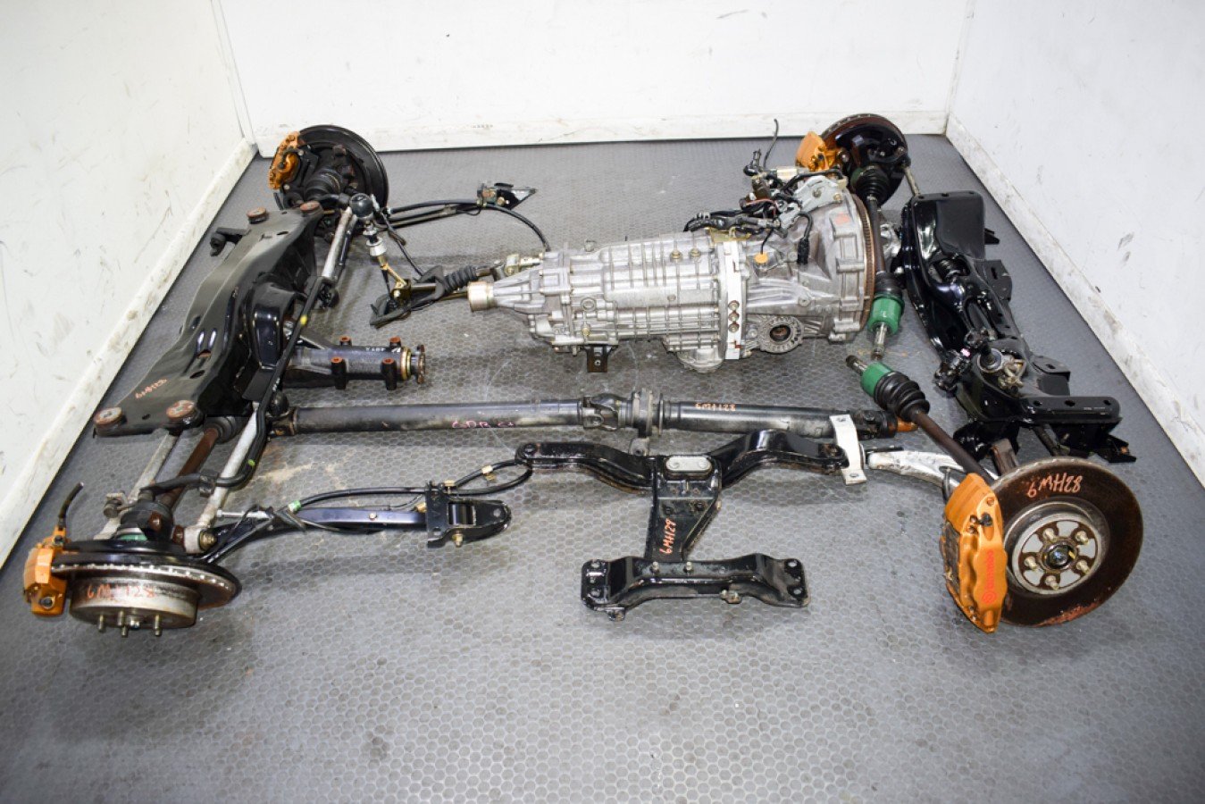 Used JDM Subaru Forester STI 6 Speed TY856WL4CC non DCCD Transmission Package with Brembo Calipers and R180 Differential For Sale.