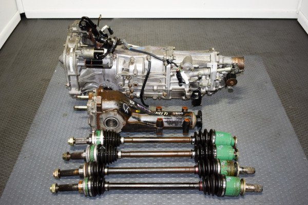 2002-2004 Subaru WRX Manual AWD Transmission TY754VBBAA with Matching 4.44 Rear Differential and Axles for Sale.